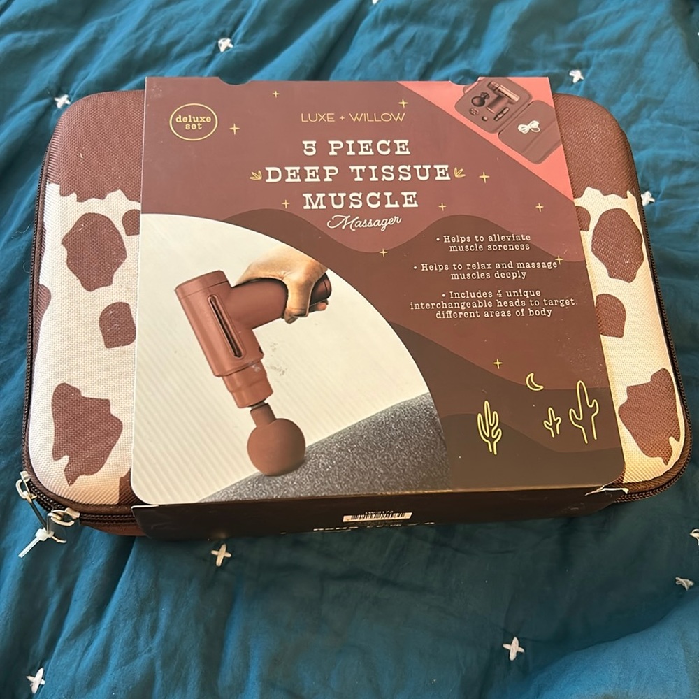 Never opened 5 Piece deep tissue muscle massager.